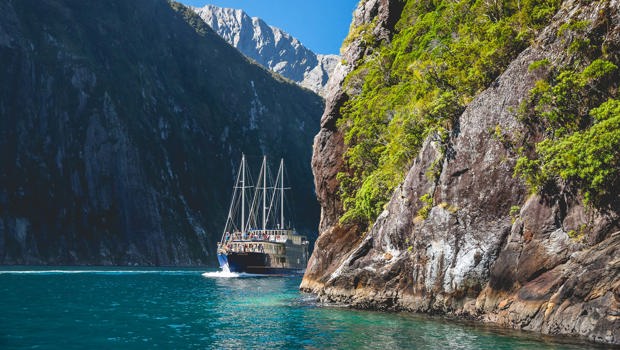 Boat cruising in Milford Sound