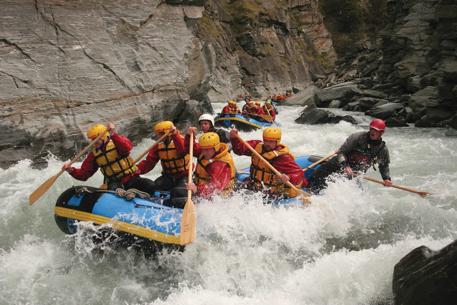 Three boats rafting down the Shotover River, Queenstown