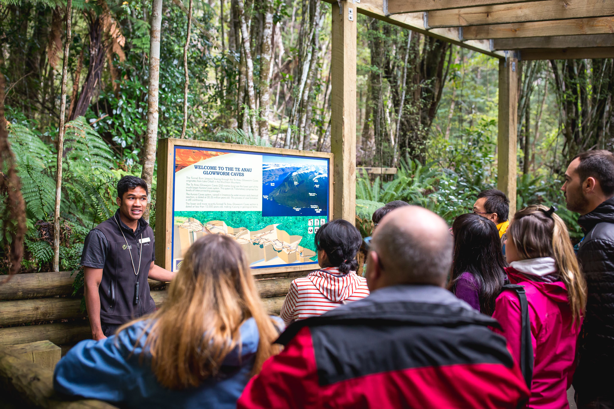 Guide with group on a Te Anau Glowworm tour