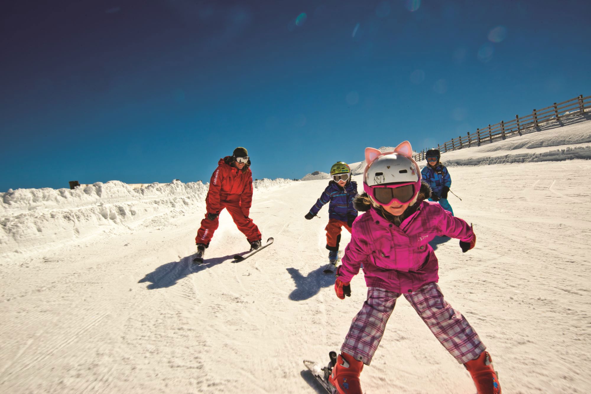 Kids and instructor on the slopes