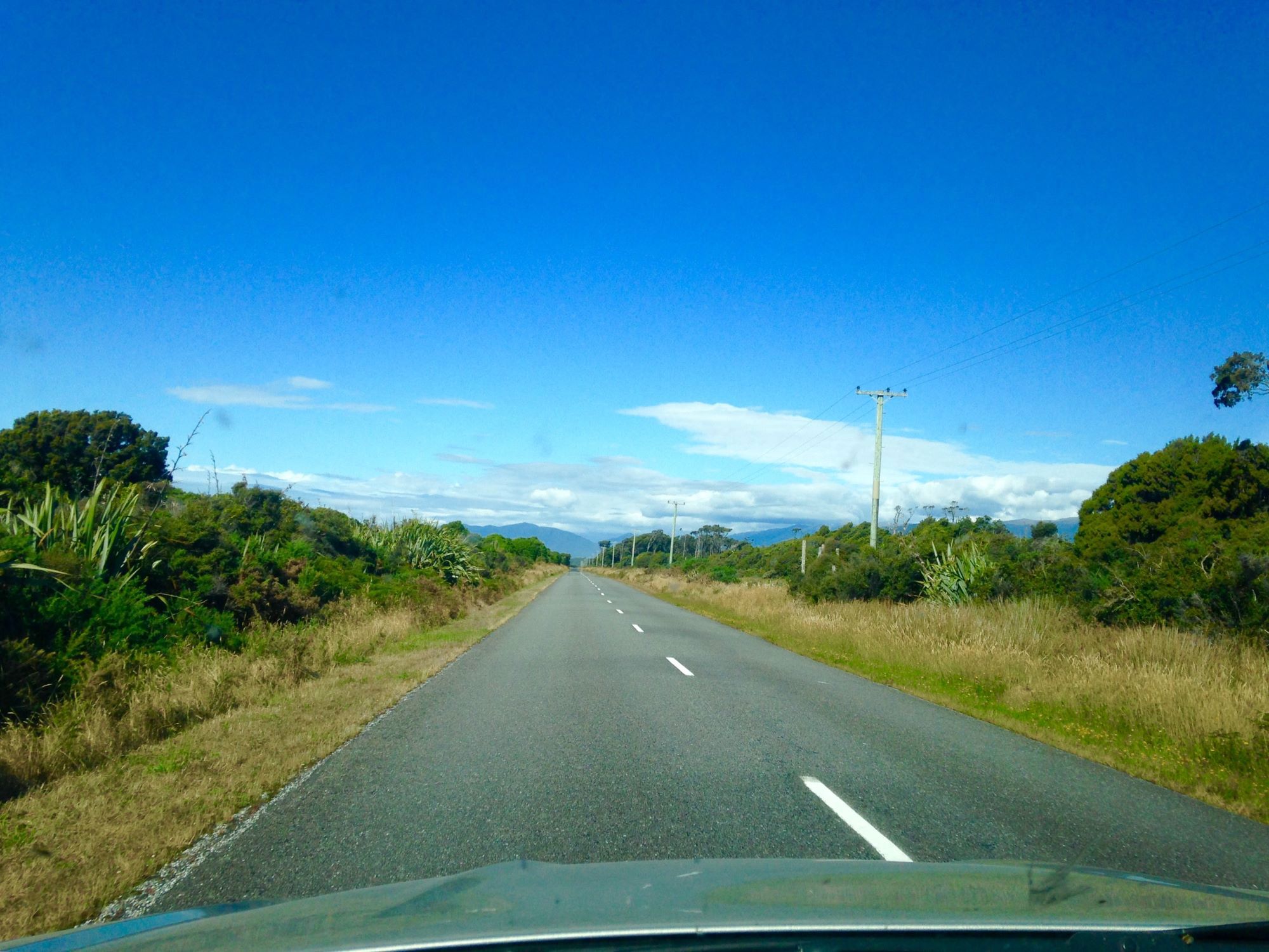 Car on coastal road