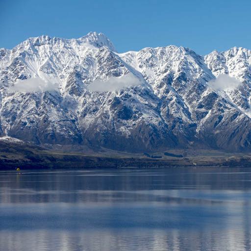 TSS Earnslaw with snowy remarkables