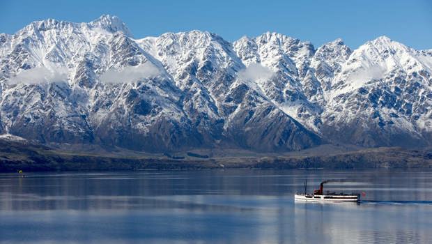 TSS Earnslaw with snowy remarkables