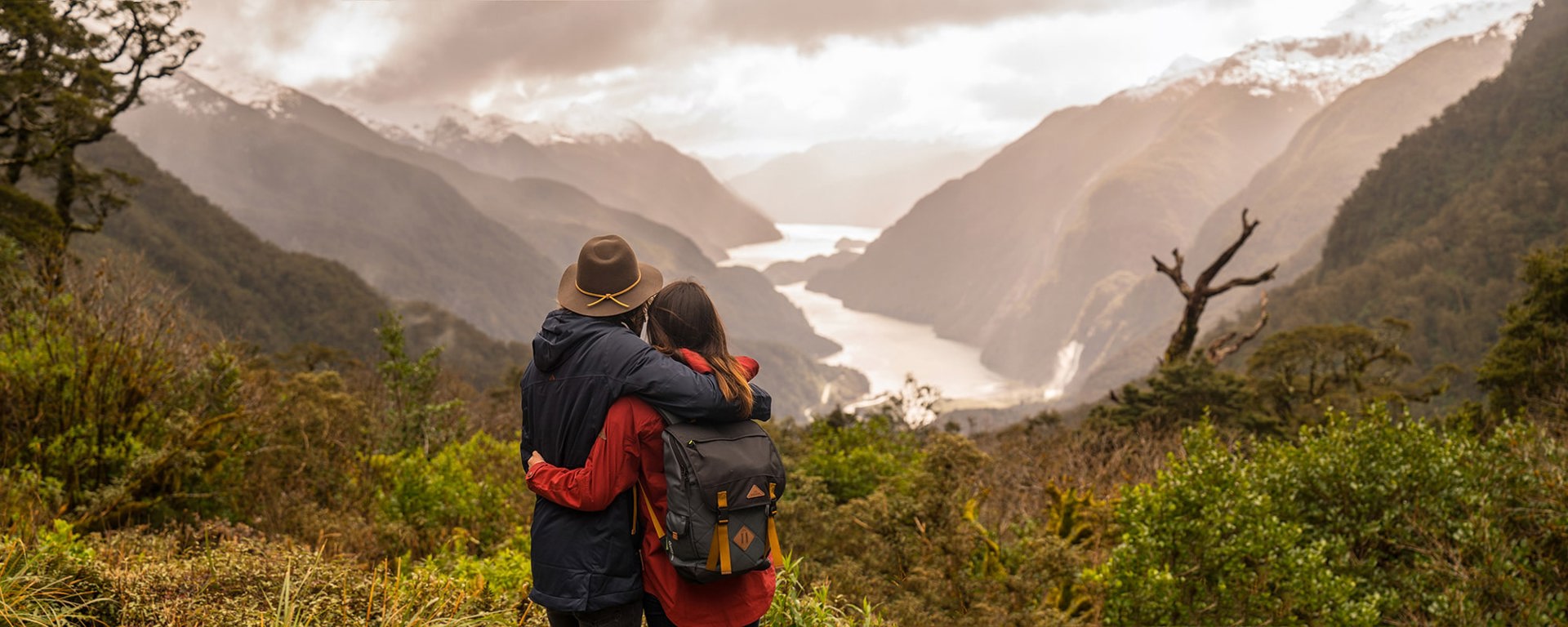 Couple at the Wilmot pass overlooking Doubtful Sound