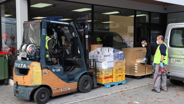 Taking delivery of fresh fruit and snacks