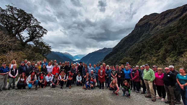 Cruise-for-a-Cause at the top of Wilmot Pass with Doubtful Sound in the background