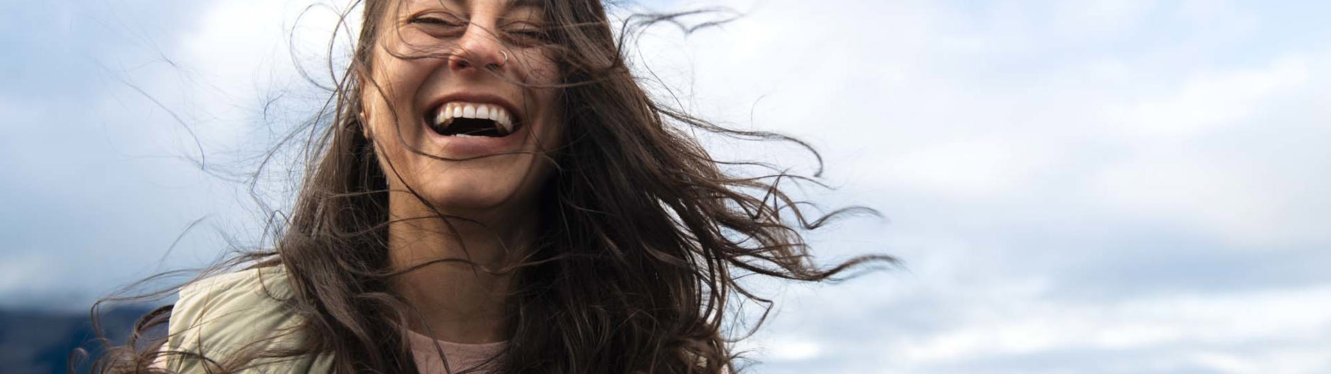 Woman laughing on the TSS Earnslaw