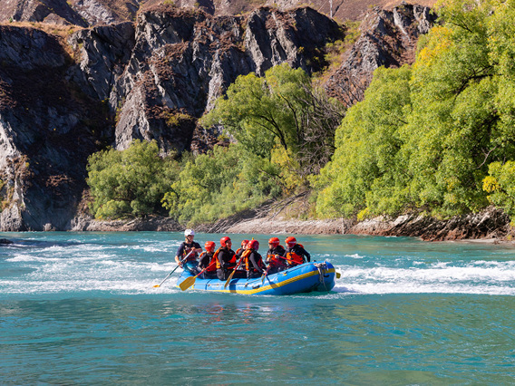 A raft paddling down the Kawarau River