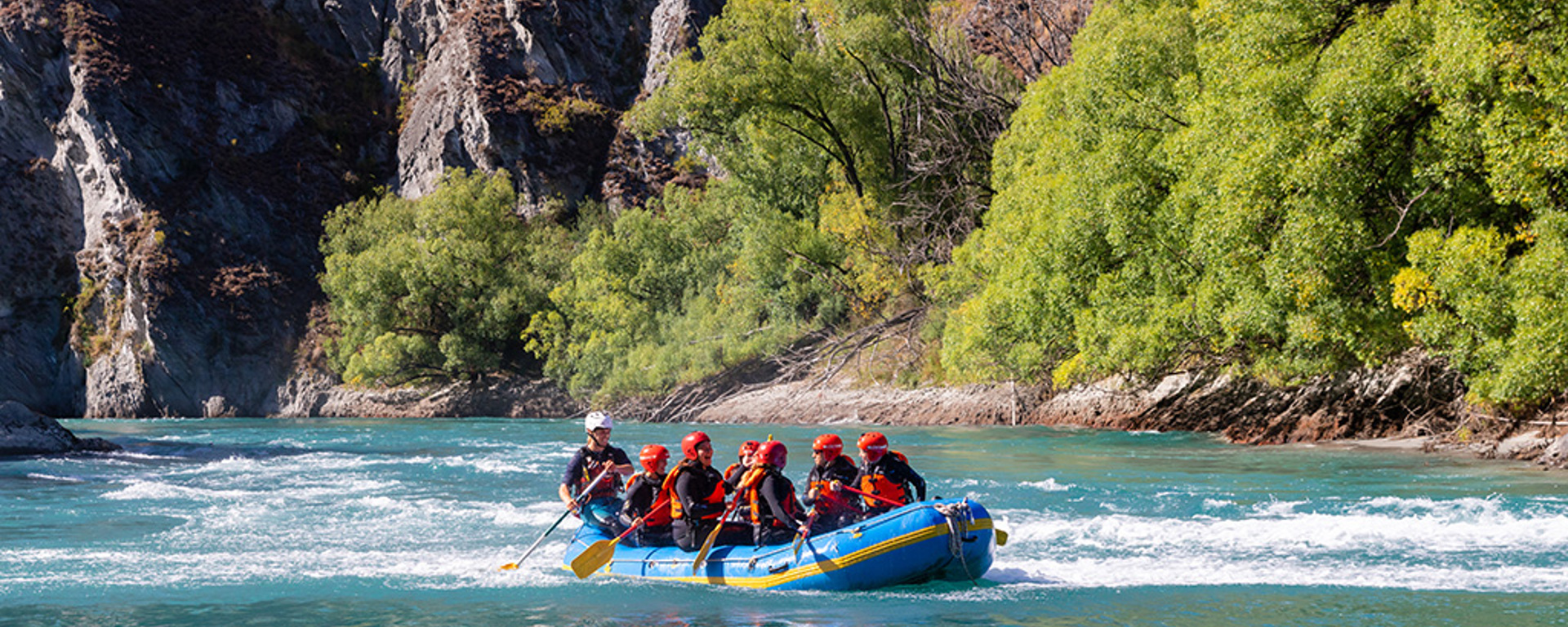 A raft paddling down the Kawarau River