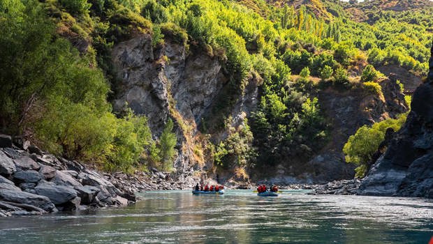 Two rafts paddling on the Kawarau river