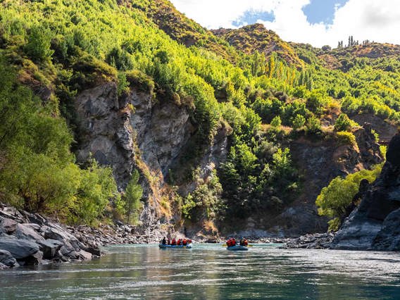 Two rafts paddling on the Kawarau river