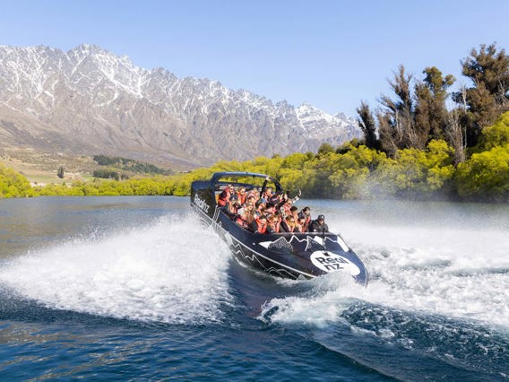 A queenstown jetboat does a 360 spin on the Kawarau River