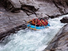 A group of rafters taking on the shotover river