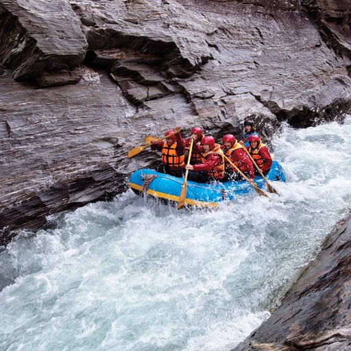 A group of rafters taking on the shotover river