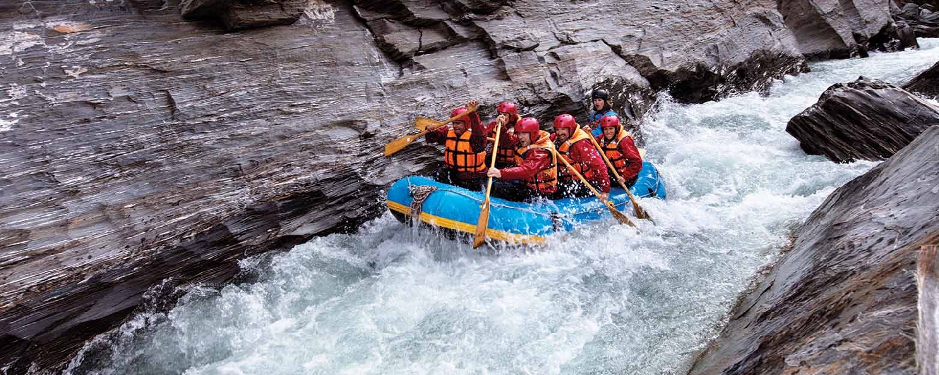 A group of rafters taking on the shotover river