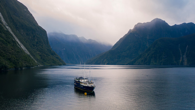 Overnight boat docked for the night in Milford Sound