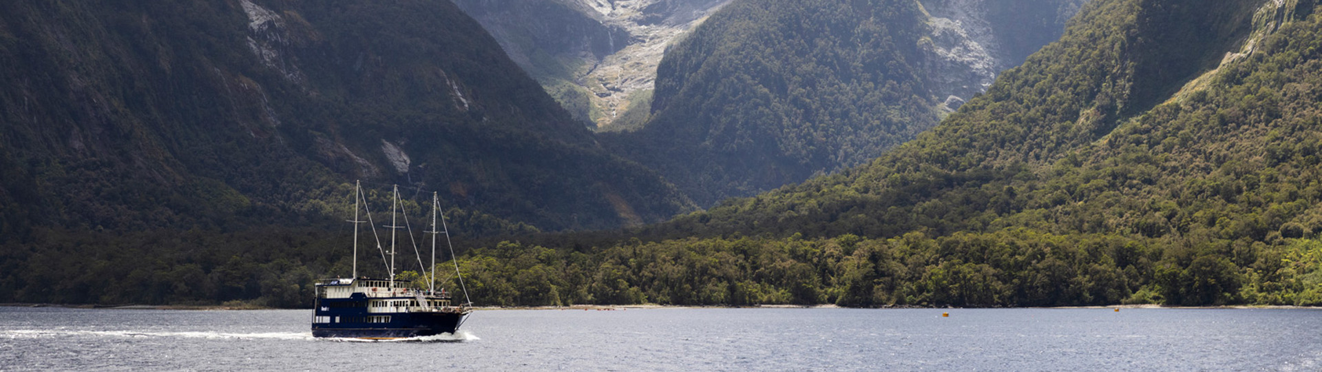 The overnight cruise vessel sailing in milford sound