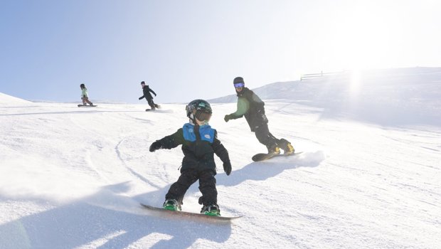 A family ride down the piste at cardrona alpine resort