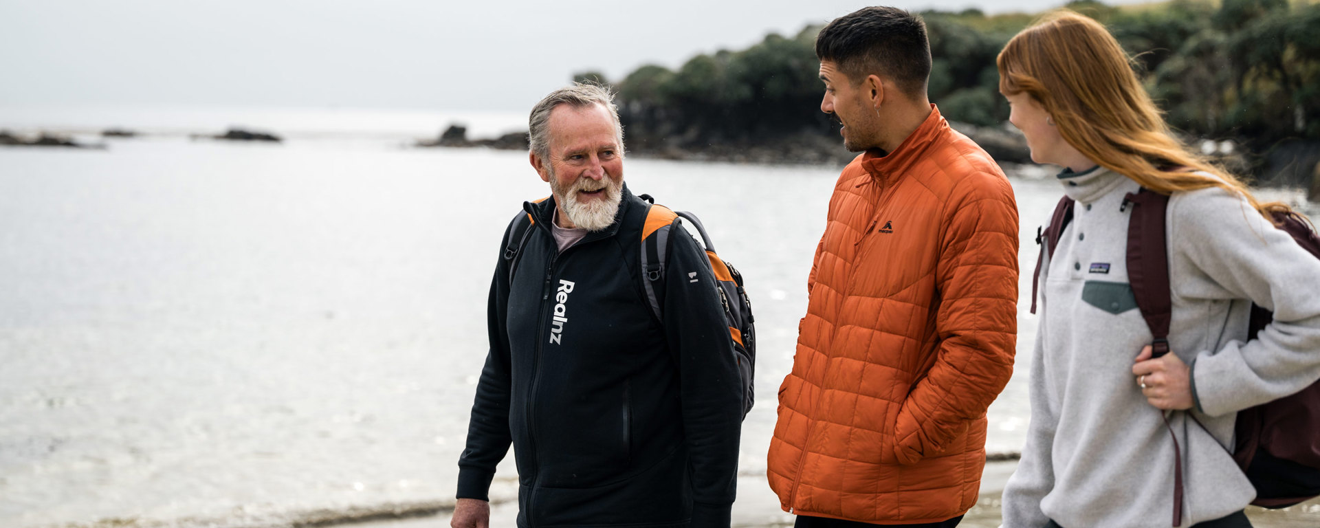 a guide showing a couple across the beach