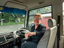 Bus driver smiling