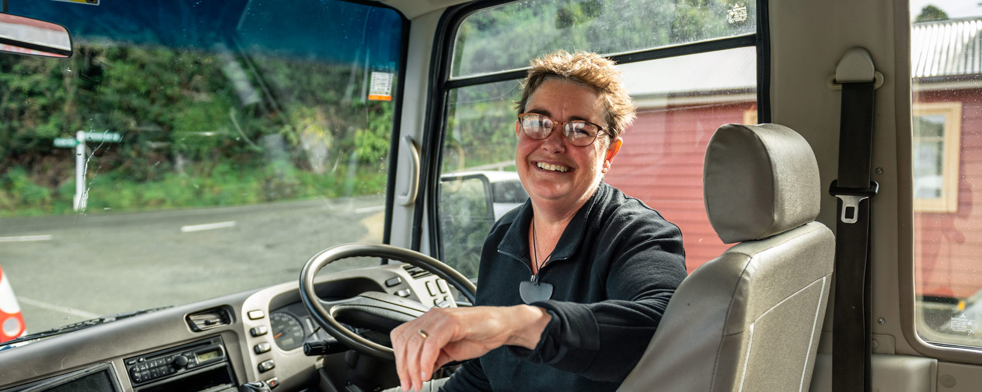 Bus driver smiling