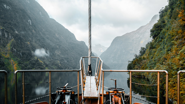 A view of peaceful Doubtful Sound taken from the bow looking out.