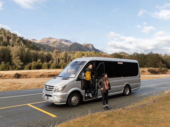 An Altitude Tours van stops for a scenic break on a tour to Milford Sound.