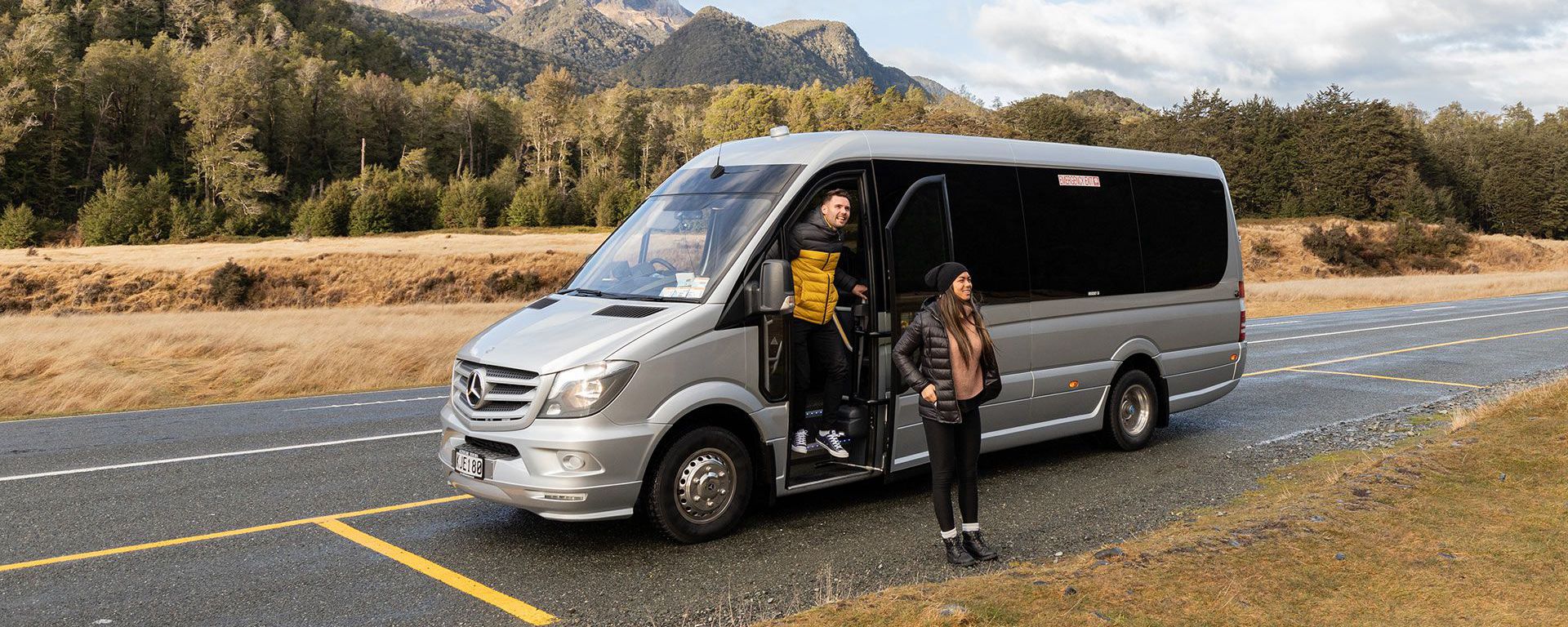 An Altitude Tours van stops for a scenic break on a tour to Milford Sound.