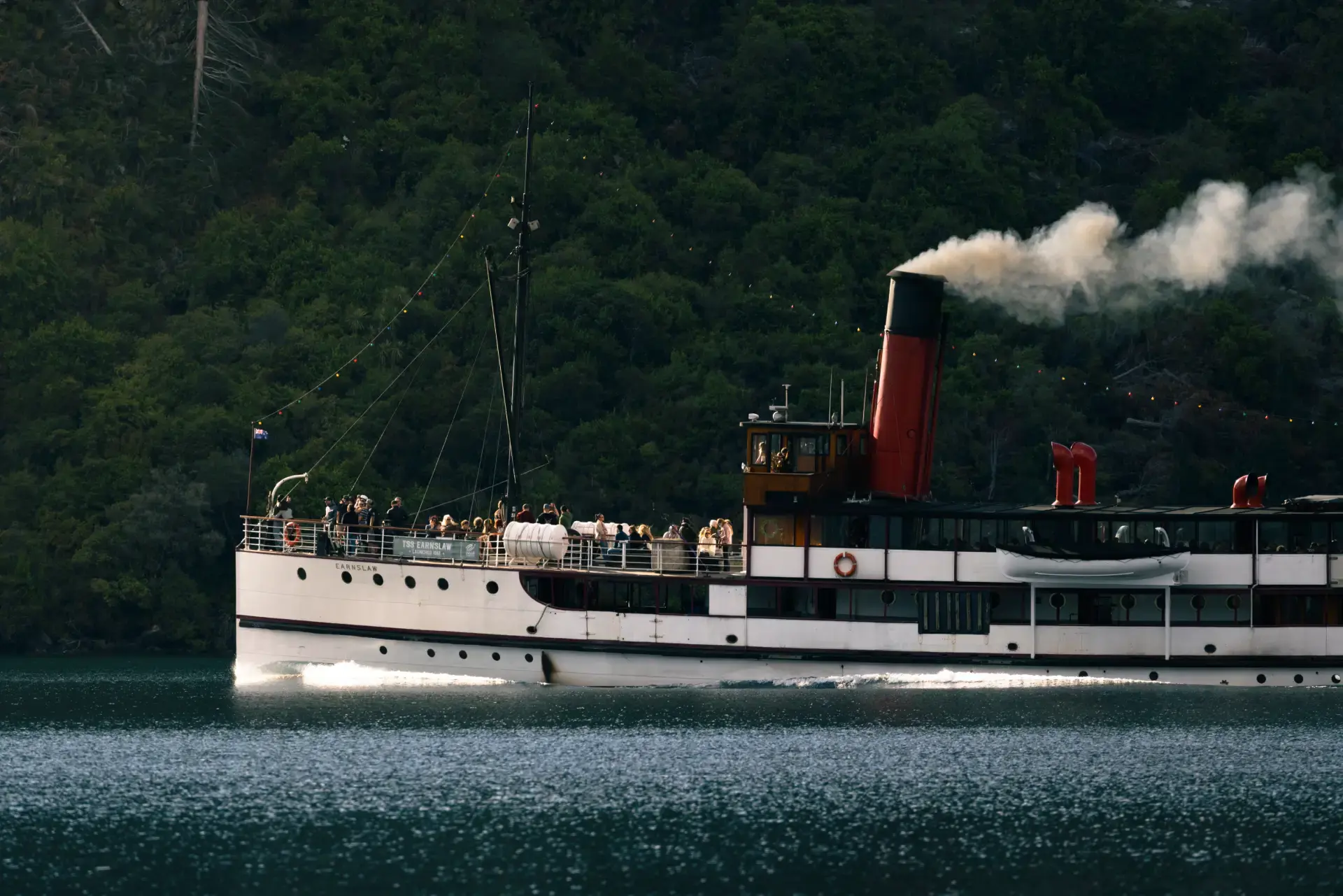 The TSS Earnslaw vintage steamship sails through the waters of Lake Whakatipu in Queenstown. 